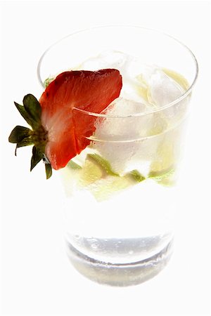 simsearch:659-02211415,k - Mineral water with lime wedges, ice cubes and strawberry Stock Photo - Premium Royalty-Free, Code: 659-01855169