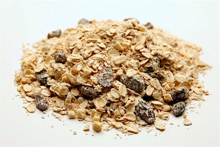 A heap of muesli with raisins Foto de stock - Sin royalties Premium, Código: 659-01855427