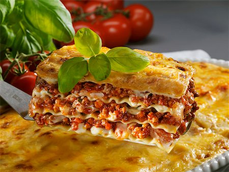 A portion of lasagne on a palette knife Foto de stock - Sin royalties Premium, Código: 659-01855482
