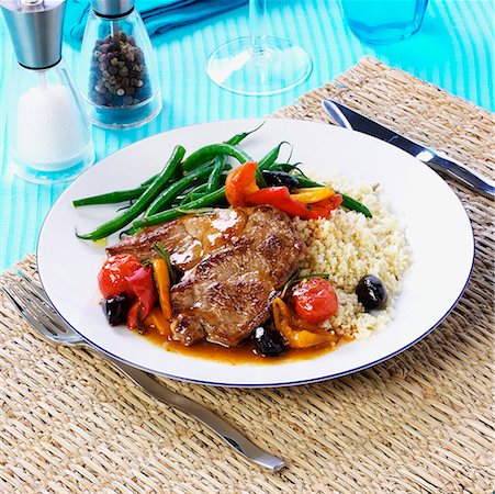 simsearch:659-01852978,k - Pork neck steak with couscous and roasted vegetables Stock Photo - Premium Royalty-Free, Code: 659-01855599