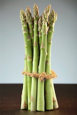 set up - A bundle of green asparagus Stock Photo - Premium Royalty-Free, Code: 659-01855728