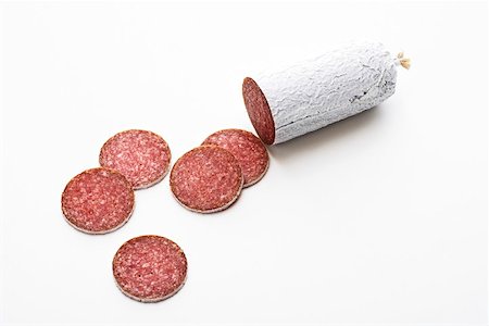 simsearch:659-01865070,k - A partly sliced salami Stock Photo - Premium Royalty-Free, Code: 659-01855882