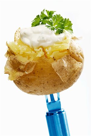 A baked potato with herb quark Foto de stock - Sin royalties Premium, Código: 659-01855895