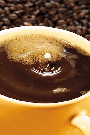 dripping coffee - A drop of milk falling into a cup of coffee Stock Photo - Premium Royalty-Free, Code: 659-01855943