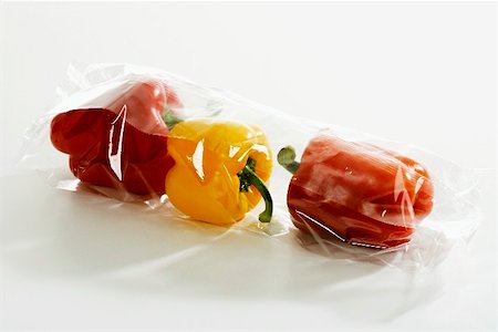 Stock Up On Winter Food. Chef Puts Bell Pepper Into Plastic Container For  Freezing. Stock Photo, Picture and Royalty Free Image. Image 65590921.