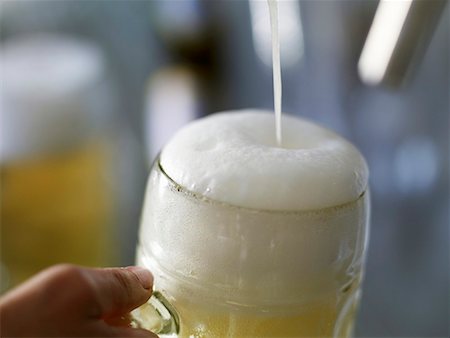 shandy - Pouring a litre of shandy Stock Photo - Premium Royalty-Free, Code: 659-01855999