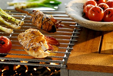 simsearch:659-07958278,k - Chicken breast stuffed with cheese and bacon on barbecue Stock Photo - Premium Royalty-Free, Code: 659-01856072