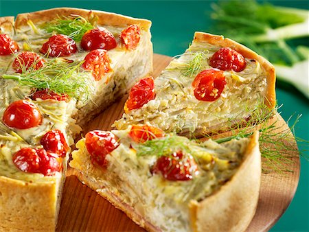 fennel dish - A fennel and tomato tart, partly sliced Stock Photo - Premium Royalty-Free, Code: 659-01856285