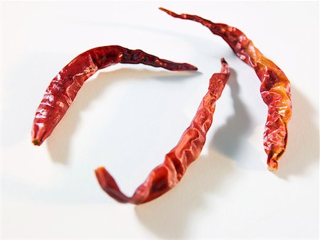 simsearch:659-01845447,k - Three dried chillies Stock Photo - Premium Royalty-Free, Code: 659-01856437