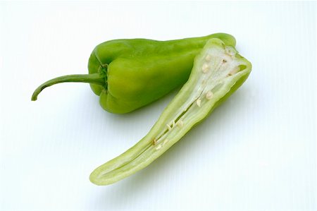 simsearch:659-01859414,k - Half and whole green pointed pepper Stock Photo - Premium Royalty-Free, Code: 659-01856495