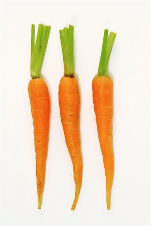 Three carrots Fotografie stock - Premium Royalty-Free, Codice: 659-01856684