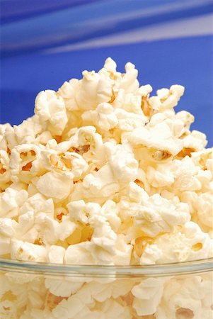 popcorn not person - Popcorn in a glass bowl Stock Photo - Premium Royalty-Free, Code: 659-01856689