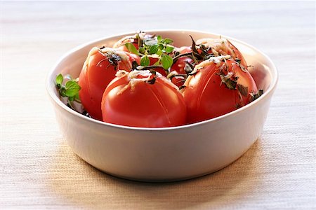 simsearch:659-03528079,k - Tomatoes with marjoram and toasted cheese topping Stock Photo - Premium Royalty-Free, Code: 659-01856732