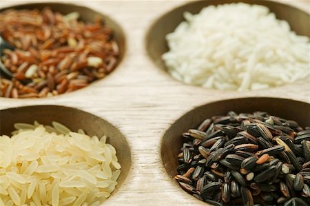 Four different types of rice (close-up) Stock Photo - Premium Royalty-Free, Code: 659-01856808