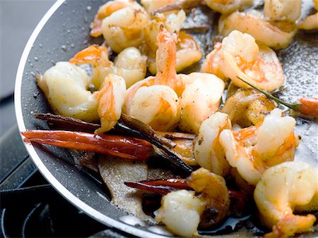 shrimp in frying pan dish - Fried shrimps with chili peppers in frying pan Stock Photo - Premium Royalty-Free, Code: 659-01857068