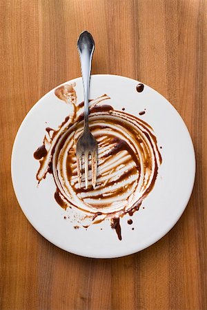 Plate with remains of chocolate sauce Stock Photo - Premium Royalty-Free, Code: 659-01857093