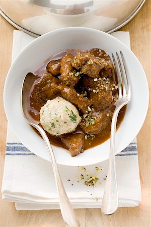 Beef goulash with bread dumpling Stock Photo - Premium Royalty-Free, Code: 659-01857114