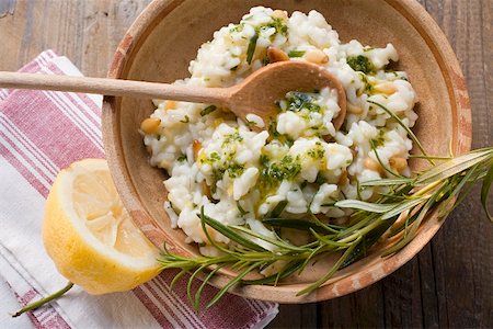 european rice dish - Lemon risotto with pine nuts, herb oil and rosemary Stock Photo - Premium Royalty-Free, Code: 659-01857168