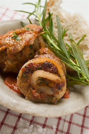 simsearch:659-01861281,k - Belly pork rolls with tomato pesto and rosemary Stock Photo - Premium Royalty-Free, Code: 659-01857286