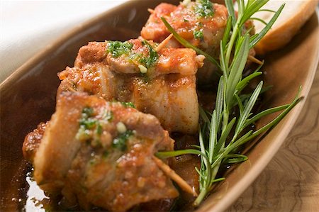 simsearch:659-01845816,k - Belly pork rolls with tomato pesto and rosemary Stock Photo - Premium Royalty-Free, Code: 659-01857281