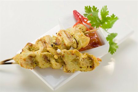 simsearch:659-01857328,k - Spicy satay with sweet and sour chili sauce Stock Photo - Premium Royalty-Free, Code: 659-01857326