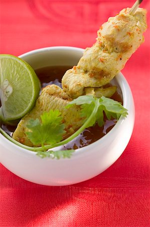 satay kebab - Spicy satay with sweet and sour chili sauce (Indonesia) Stock Photo - Premium Royalty-Free, Code: 659-01857323