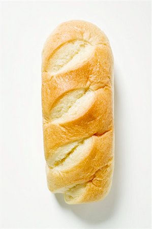 simsearch:659-01857799,k - A bloomer (crusty white loaf) Stock Photo - Premium Royalty-Free, Code: 659-01857493