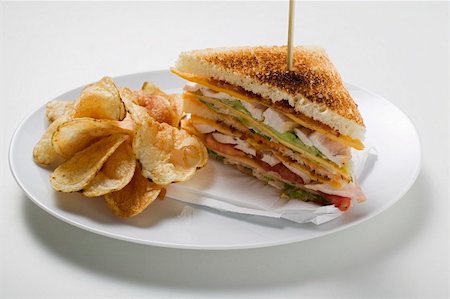 simsearch:659-03533329,k - Club sandwiches, toasted, with crisps Stock Photo - Premium Royalty-Free, Code: 659-01857559