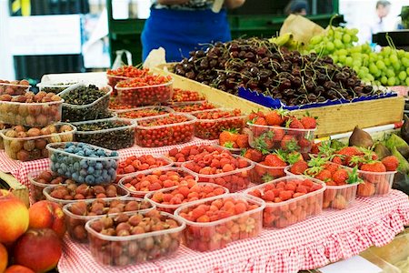 Fresh berries, cherries and grapes at a market Stock Photo - Premium Royalty-Free, Code: 659-01857647