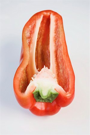 red bell pepper above - Red pepper, halved Stock Photo - Premium Royalty-Free, Code: 659-01857696