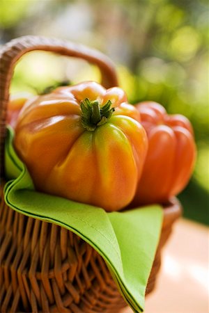 Fresh tomatoes in a basket Stock Photo - Premium Royalty-Free, Code: 659-01857852
