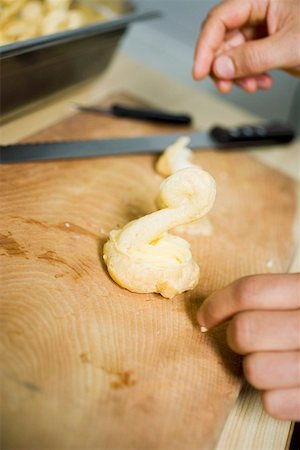 Making a choux pastry swan with cream Stock Photo - Premium Royalty-Free, Code: 659-01858151