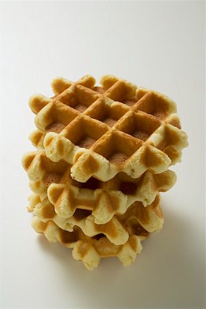 Small waffles, in a pile Stock Photo - Premium Royalty-Free, Code: 659-01858437