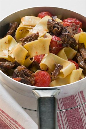 Pappardelle with braised oxtail and tomatoes Stock Photo - Premium Royalty-Free, Code: 659-01858524