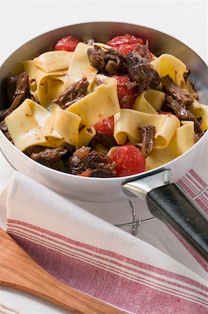 Pappardelle with braised oxtail and tomatoes Stock Photo - Premium Royalty-Free, Code: 659-01858525