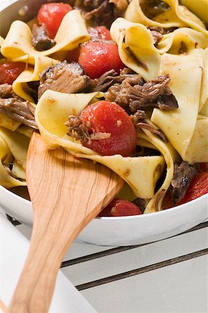 Pappardelle with braised oxtail and tomatoes Stock Photo - Premium Royalty-Free, Code: 659-01858527
