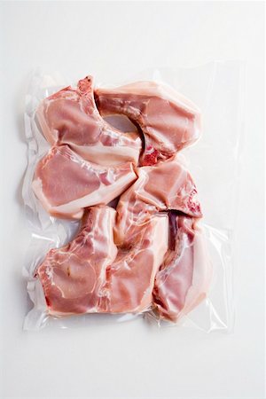 Côtelettes de porc, vide emballés Photographie de stock - Premium Libres de Droits, Code: 659-01858767