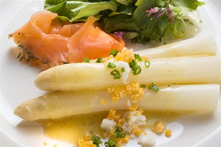 simsearch:659-01849805,k - White asparagus with smoked salmon, egg sauce & salad leaves Stock Photo - Premium Royalty-Free, Code: 659-01858775