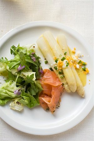 simsearch:659-01849805,k - White asparagus with smoked salmon, egg sauce & salad leaves Stock Photo - Premium Royalty-Free, Code: 659-01858780