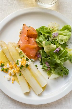 simsearch:659-01849805,k - White asparagus with smoked salmon, egg sauce & salad leaves Stock Photo - Premium Royalty-Free, Code: 659-01858781