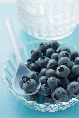 simsearch:659-02211118,k - Fresh blueberries in glass bowl with spoon Stock Photo - Premium Royalty-Free, Code: 659-01859040