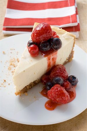 Piece of cheesecake with berries Stock Photo - Premium Royalty-Free, Code: 659-01859075