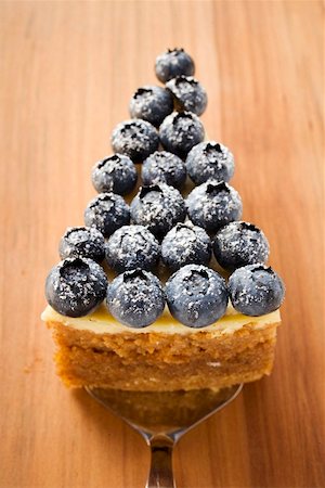 fruit cake top view - Piece of blueberry cheesecake Stock Photo - Premium Royalty-Free, Code: 659-01859079