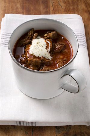 soup mug - Goulash soup with sour cream in cup Stock Photo - Premium Royalty-Free, Code: 659-01859166