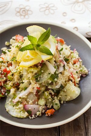 Couscous salad with vegetables, lemon and mint Stock Photo - Premium Royalty-Free, Code: 659-01859201