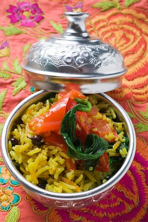 southern asian food - Saffron rice with currants, spinach and peppers (India) Stock Photo - Premium Royalty-Free, Code: 659-01859303