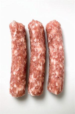 simsearch:659-02211855,k - Three salsicciole (skinless sausages, Italy) Fotografie stock - Premium Royalty-Free, Codice: 659-01859469