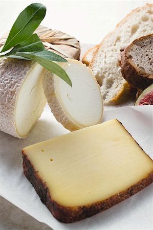 Cheese still life with bread and half a fig Stock Photo - Premium Royalty-Free, Code: 659-01859835