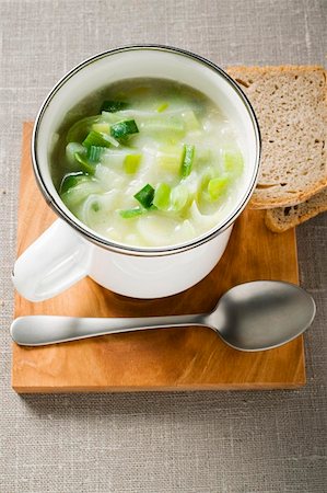 Leek cream soup with bread and spoon Stock Photo - Premium Royalty-Free, Code: 659-01850011