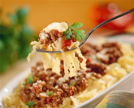 simsearch:659-01854859,k - Pasta with bolognese sauce Foto de stock - Sin royalties Premium, Código: 659-01850322